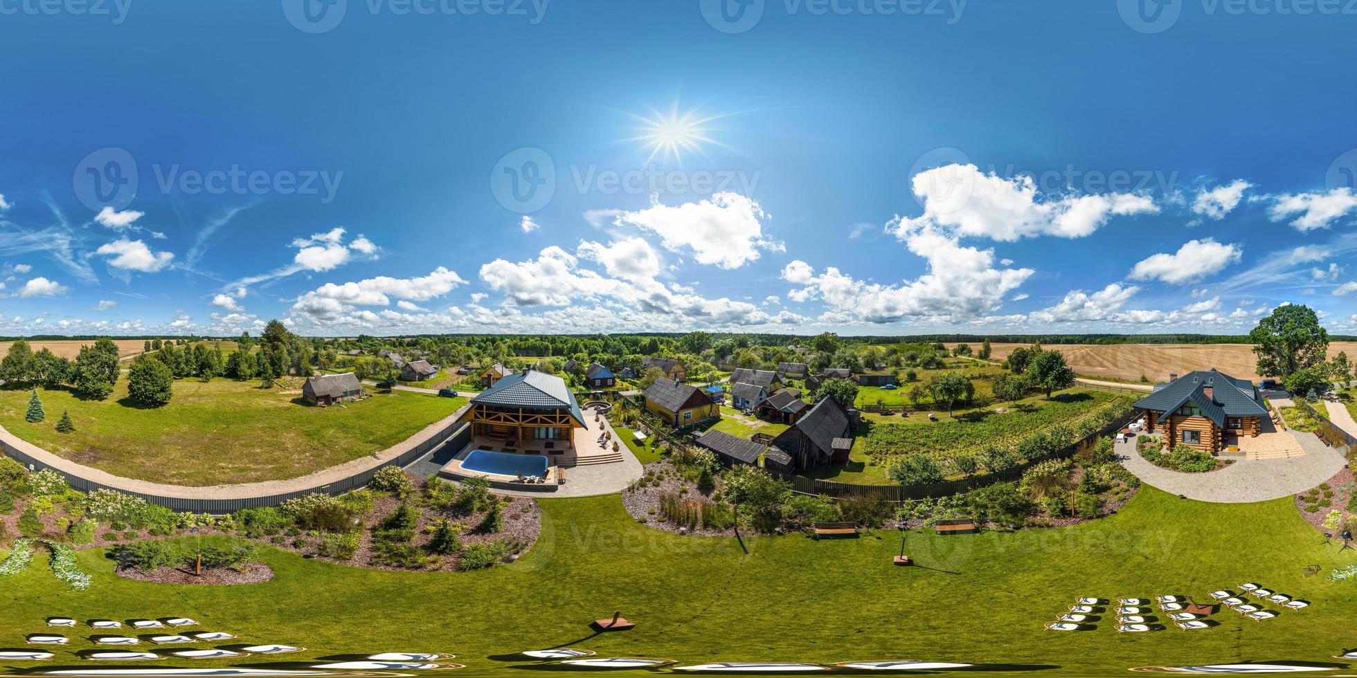 aerial full seamless spherical hdri 360 panorama view above green village with private development sector with country houses in equirectangular projection. photo