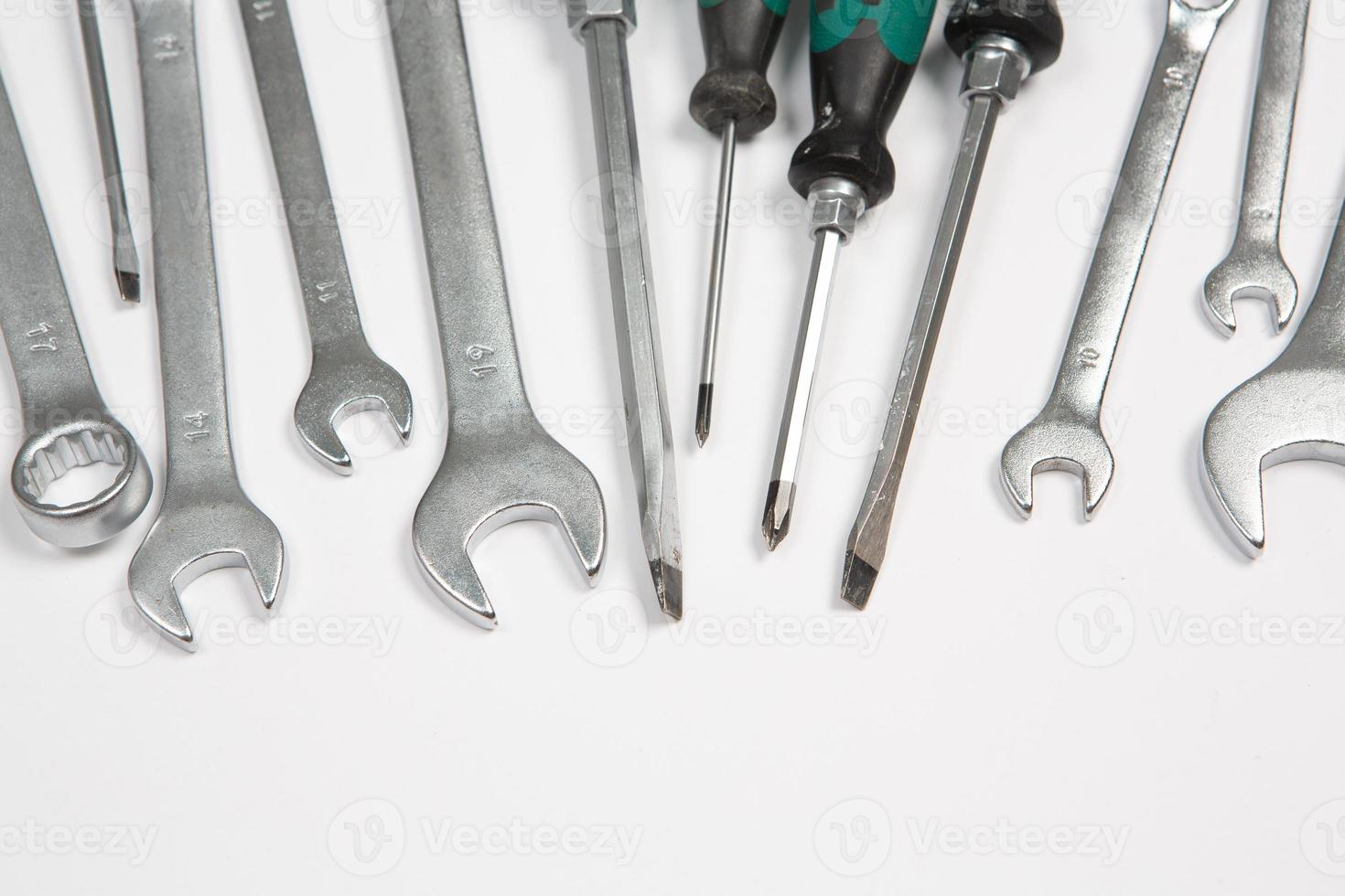 Set of tools for repair in a case on a white background. Assorted work or construction tools. Wrenches, Pliers, screwdriver. Top view photo