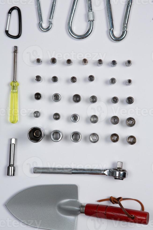 Set of tools for repair in a case on a white background. Assorted work or construction tools. Wrenches, Pliers, screwdriver. Top view photo
