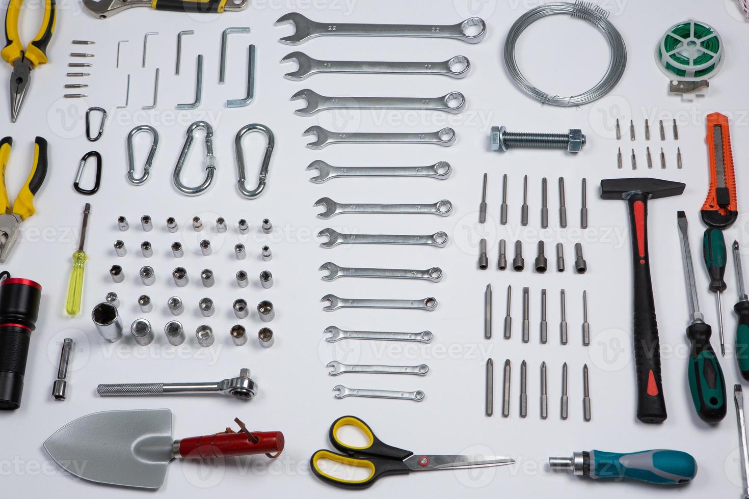 Set of tools for repair in a case on a white background. Assorted work or construction tools. Wrenches, Pliers, screwdriver. Top view photo