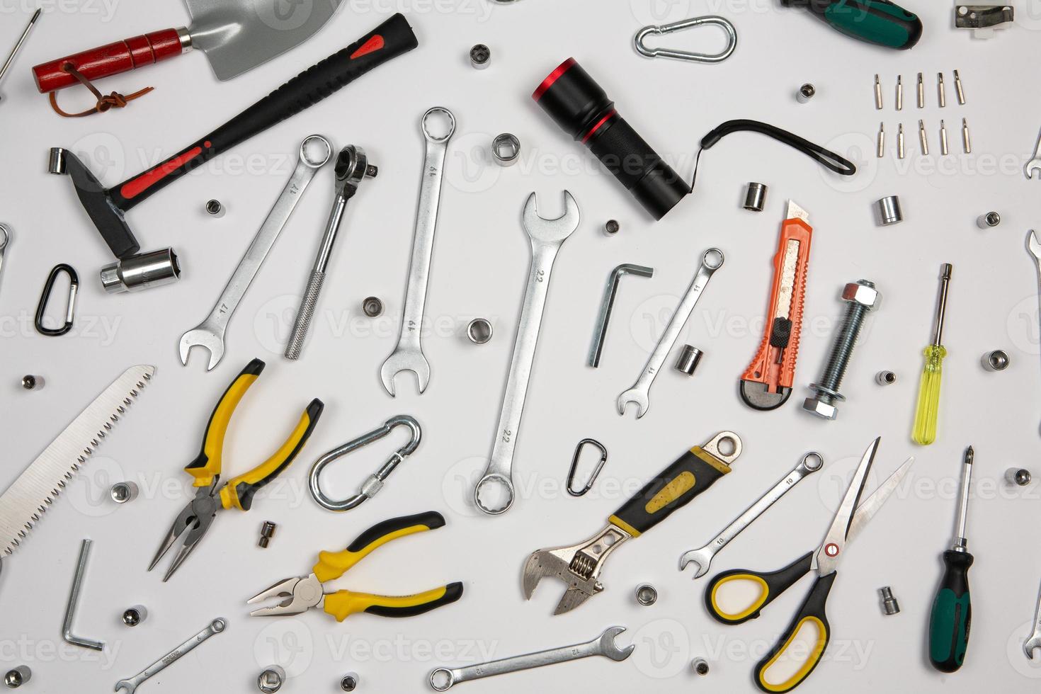 Set of tools for repair in a case on a white background. Assorted work or construction tools. Wrenches, Pliers, screwdriver. Top view photo