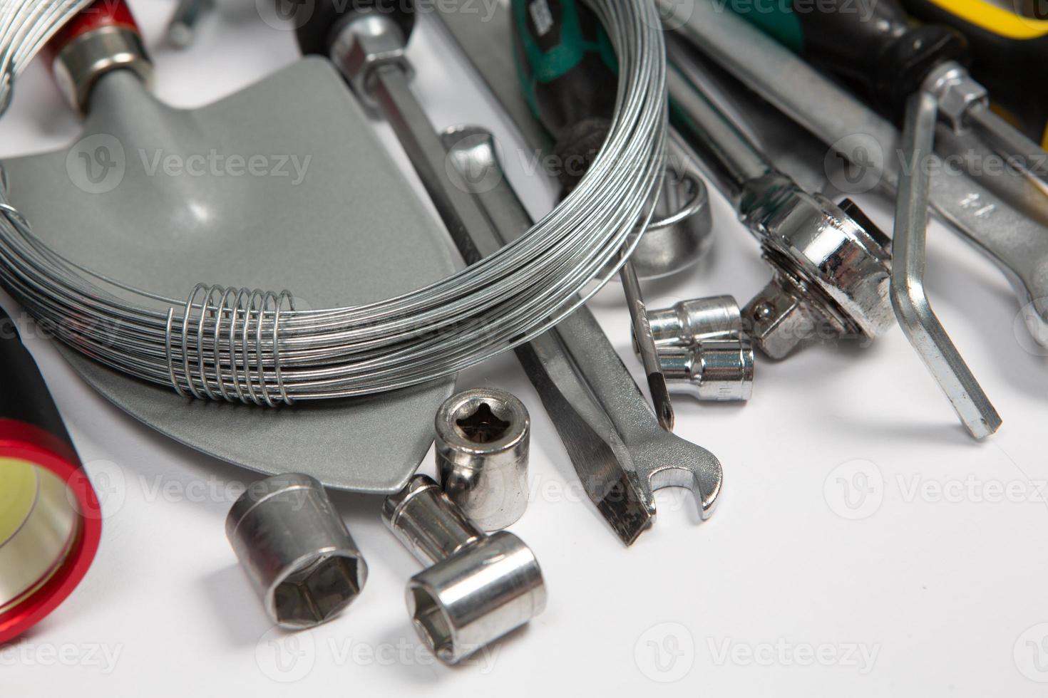 Set of tools for repair in a case on a white background. Assorted work or construction tools. Wrenches, Pliers, screwdriver. Top view photo