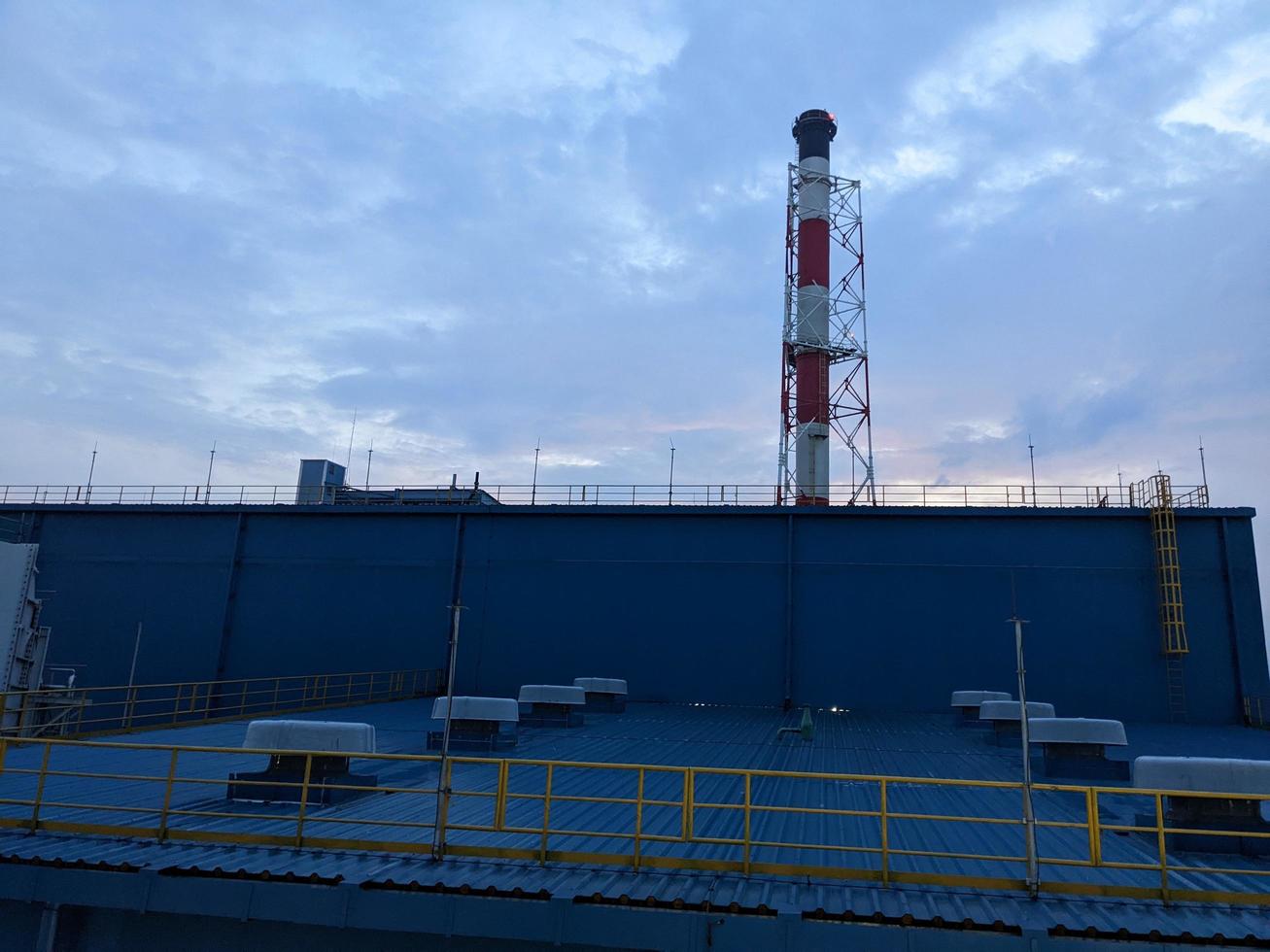 Landscape scene of power plant project for generate electricity to city. The photo is suitable to use for industrial background, power plant poster, environment content media.