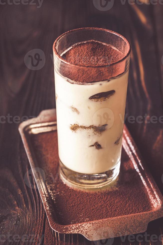 Portion of tiramisu in the glass photo