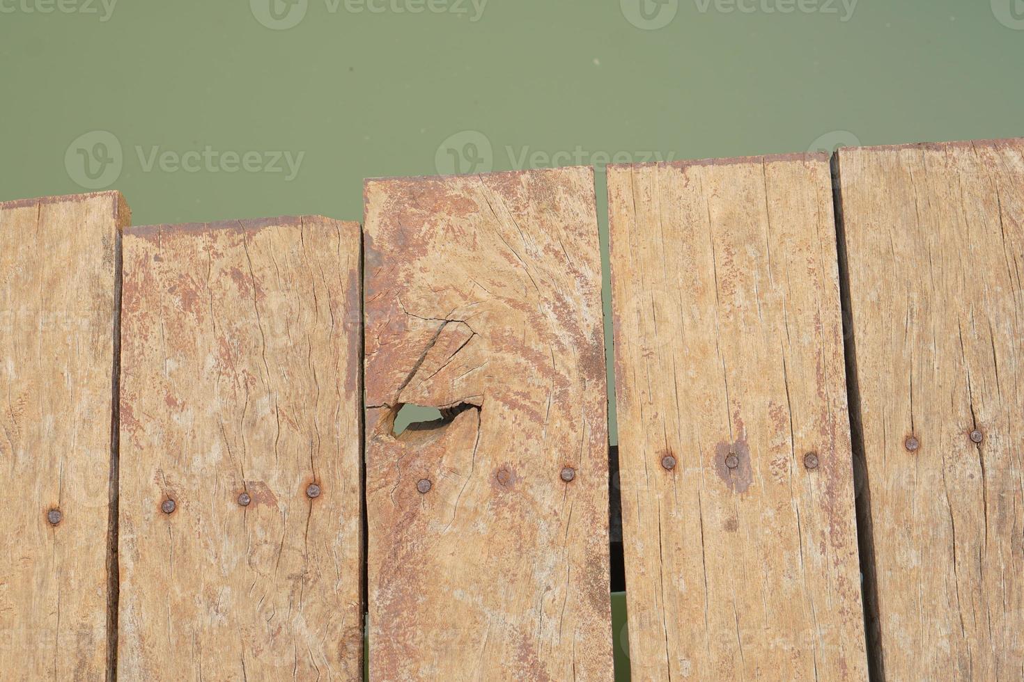 wooden floor walkway in pond photo