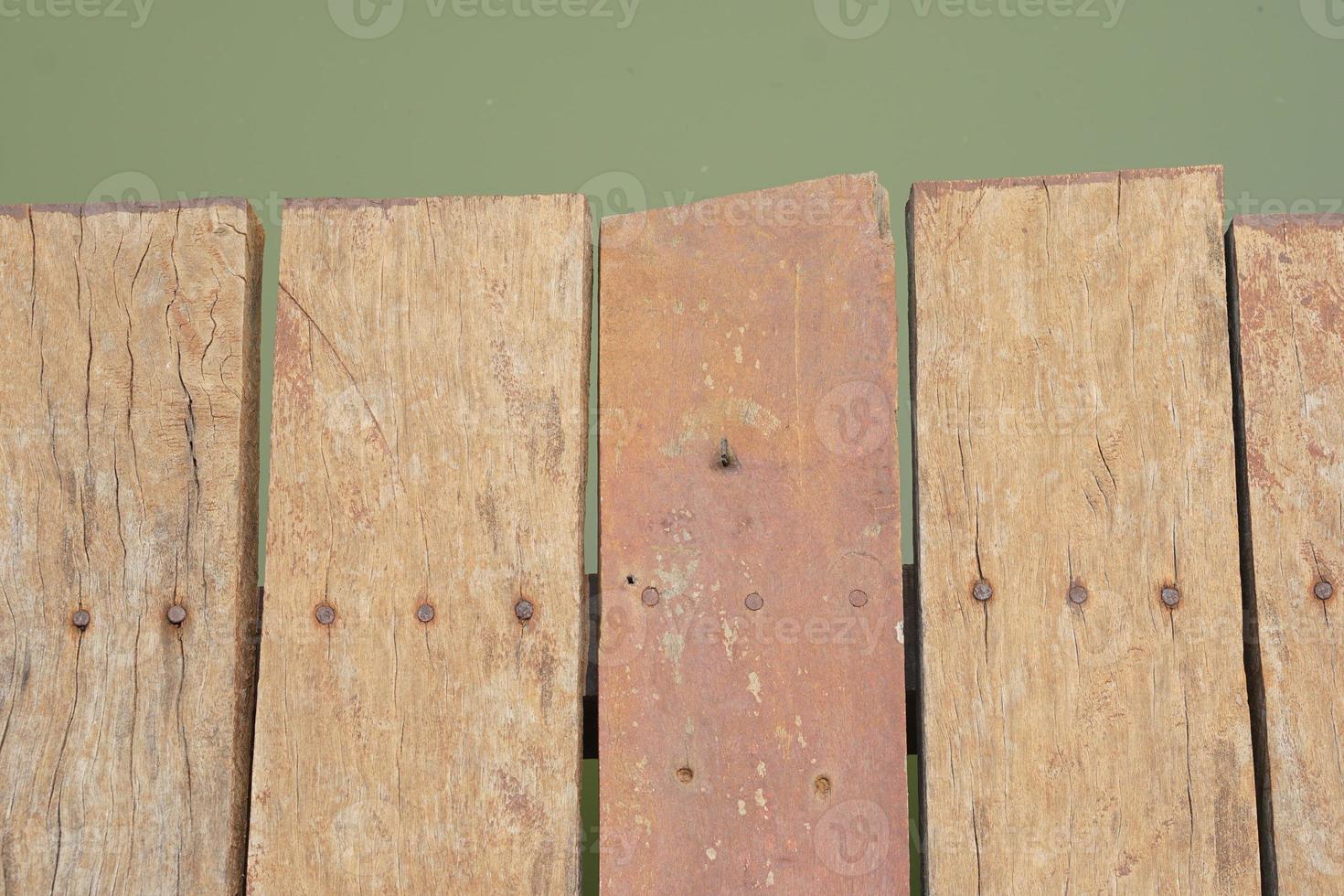 wooden floor walkway in pond photo