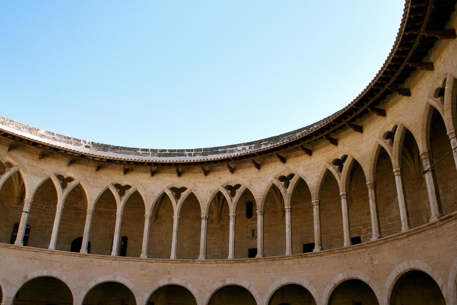 Arches of castle with columns photo