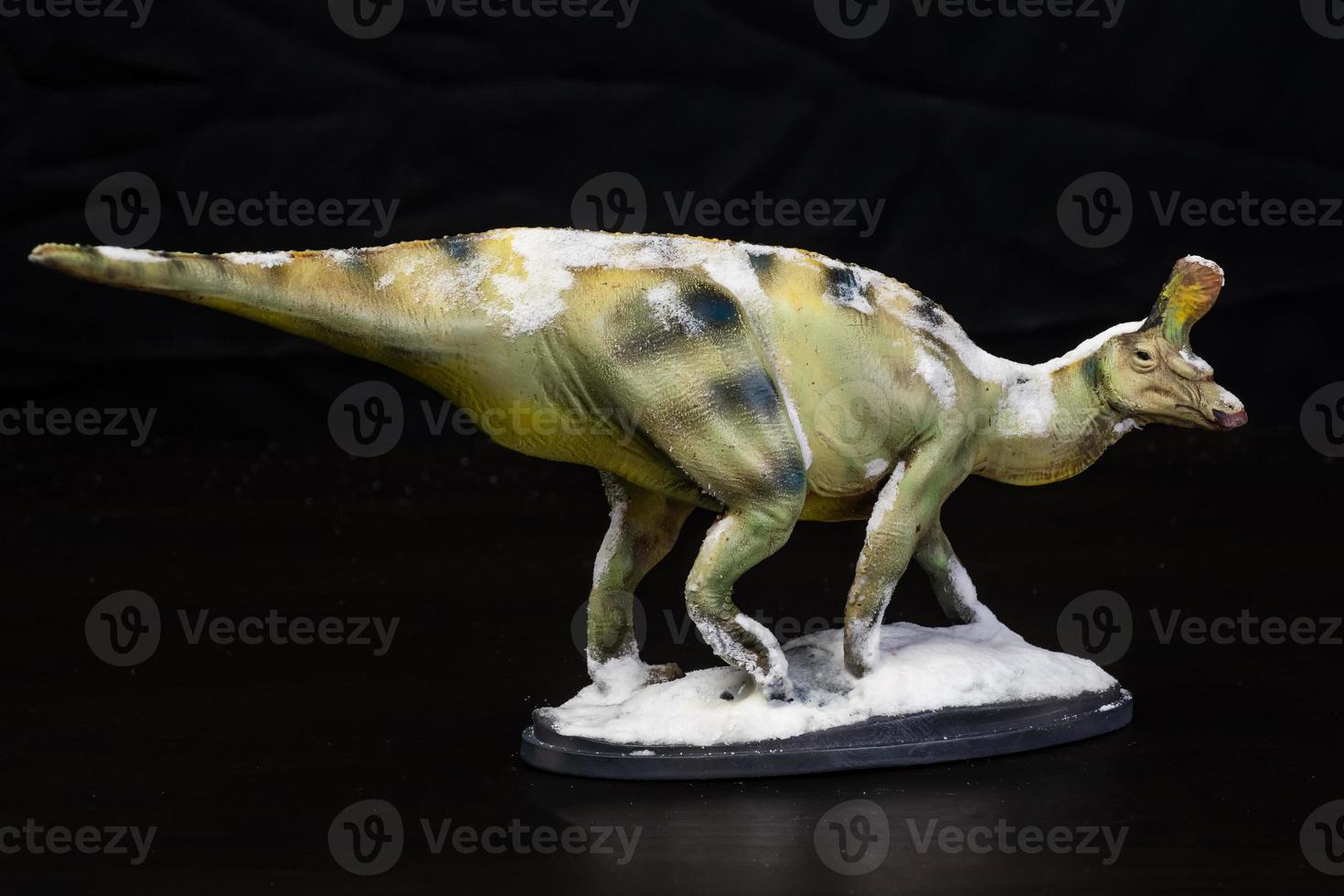 The Tsintaosaurus dinosaur  in the dark photo