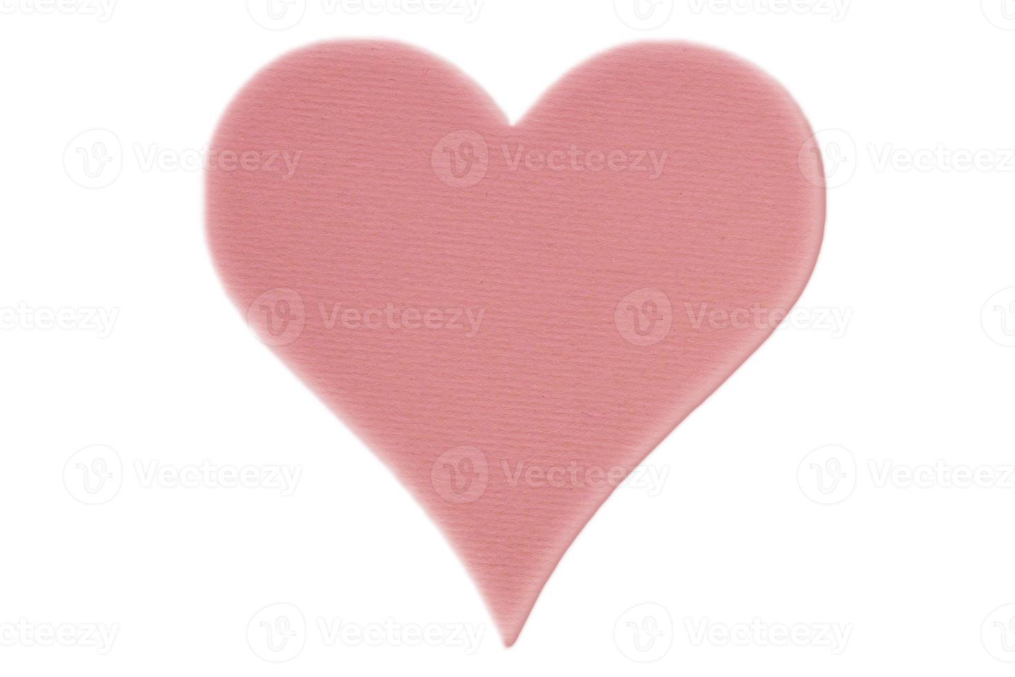 pink valentine made of cardboard isolated on white photo