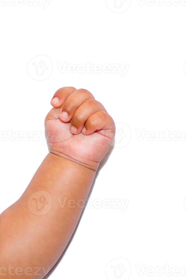 A asian new born babys Clenched hand on a white background. photo