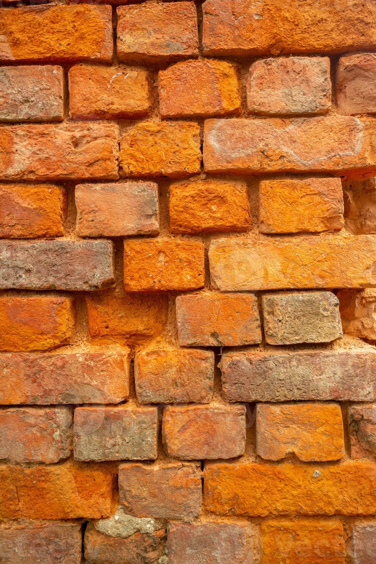 Old orange and red breakable brick arch wall with pattern. 22702730 Stock Photo at Vecteezy