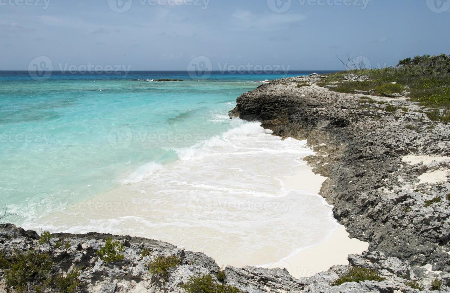 Half Moon Cay Island Tiny Beach Surrounded By Rocks photo