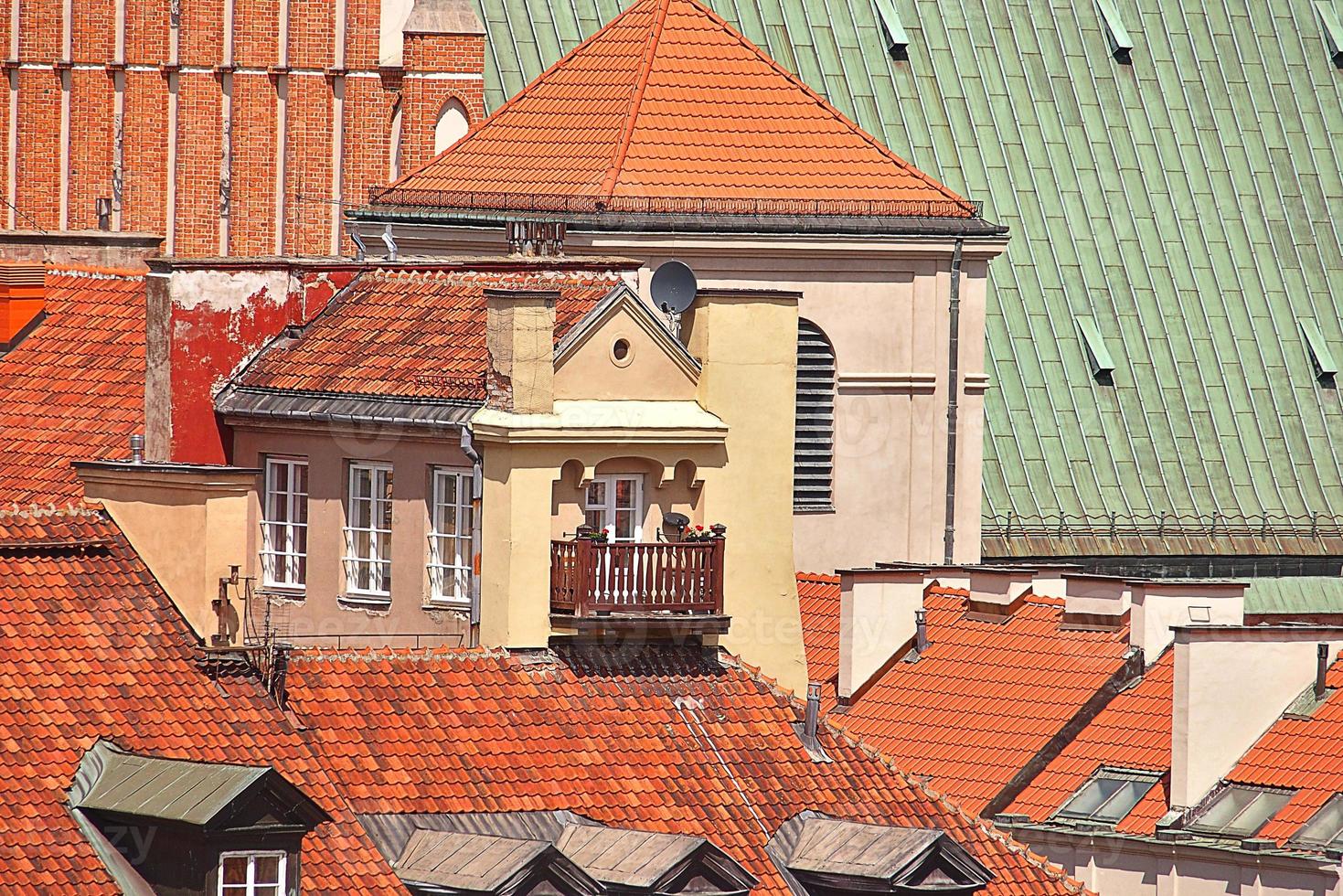 A view from above of the Warsaw old city and the surrounding buildings on a summer  day photo