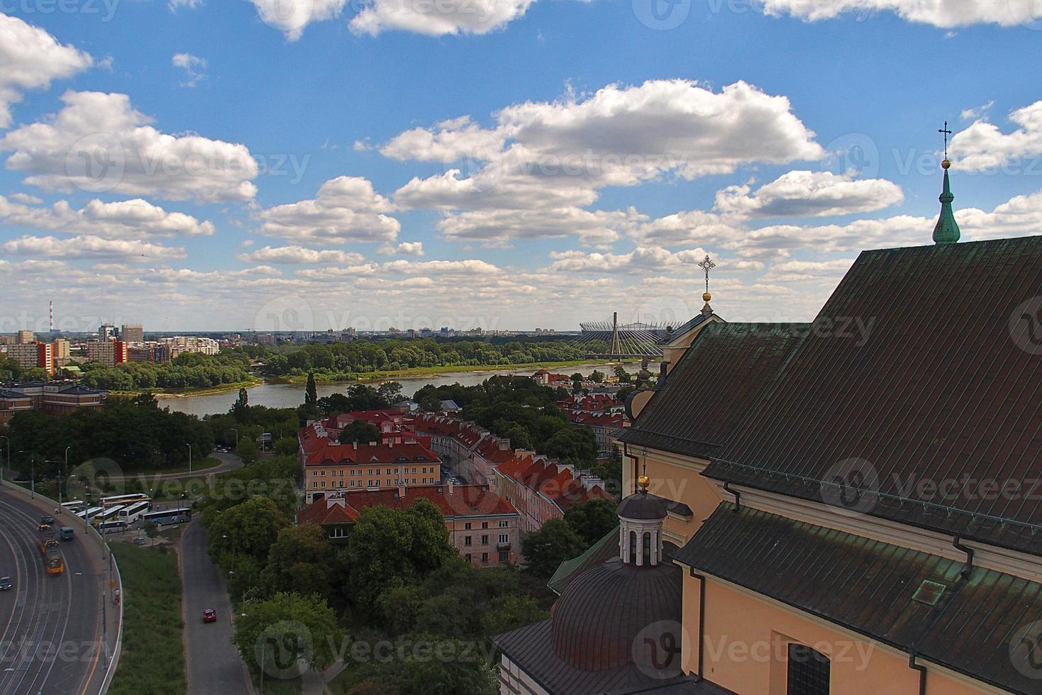 A view from above of the Warsaw old city and the surrounding buildings on a summer  day photo