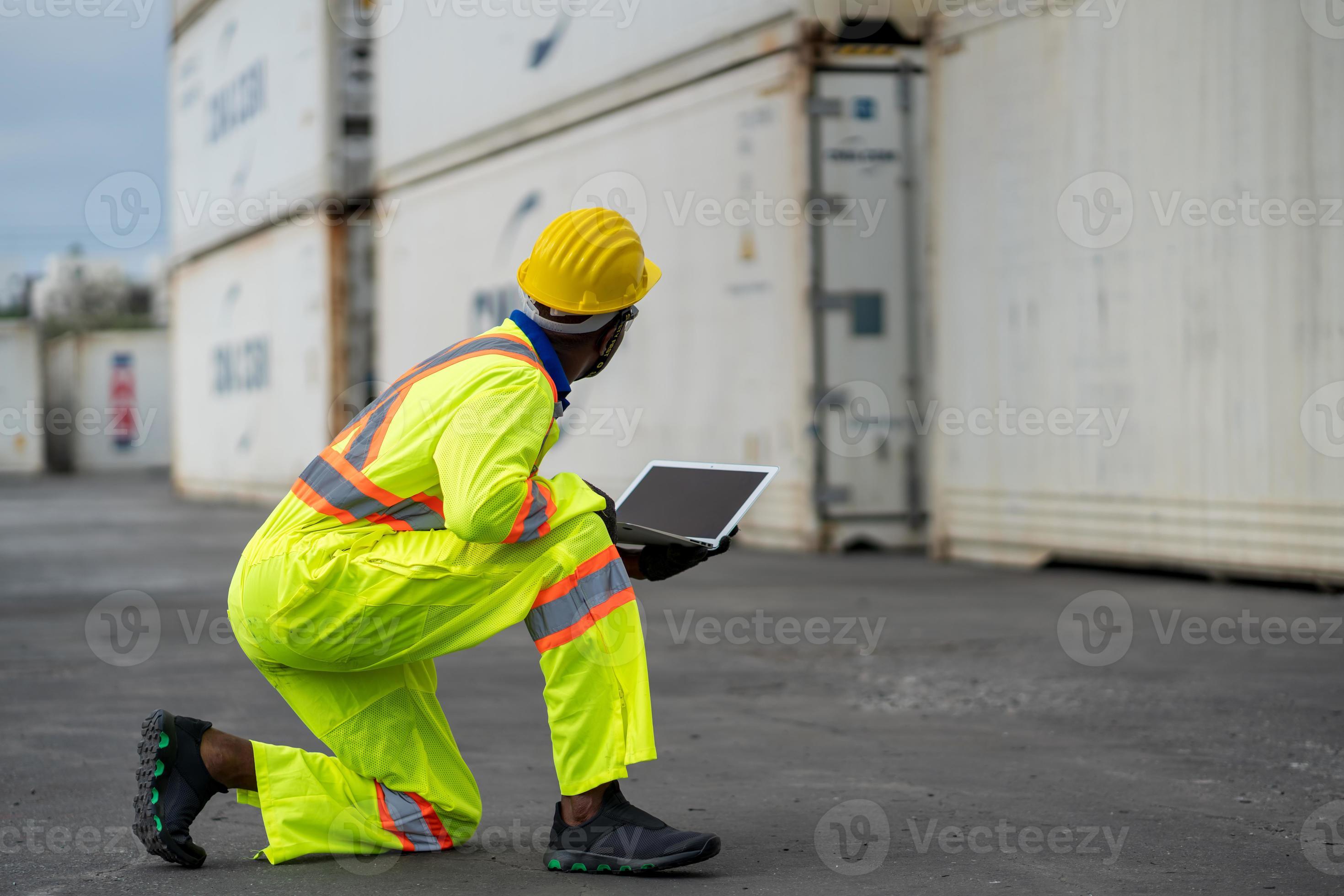 African technician dock worker in protective safety jumpsuit uniform