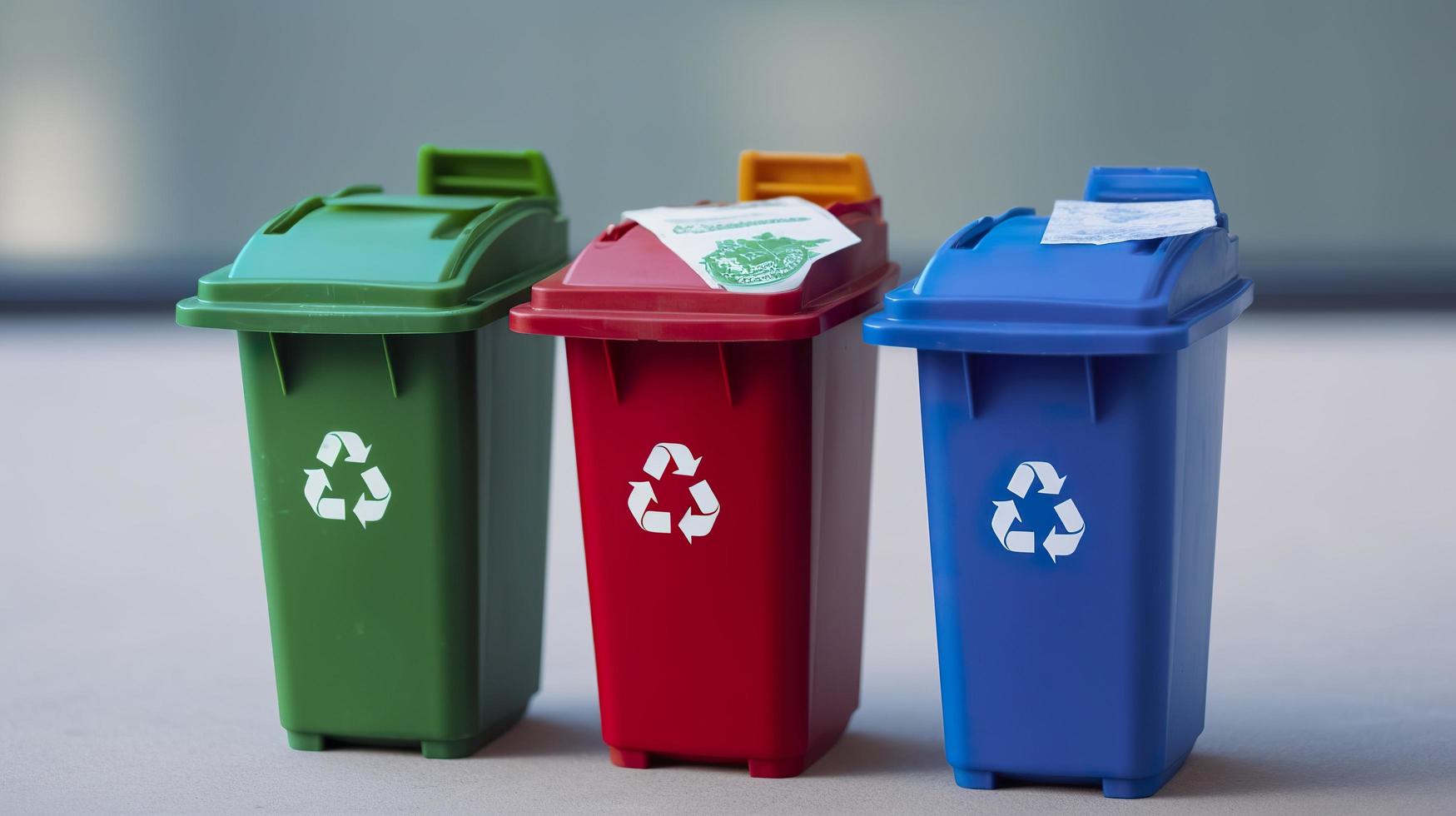 Free photo three miniature recycle bins, generat ai