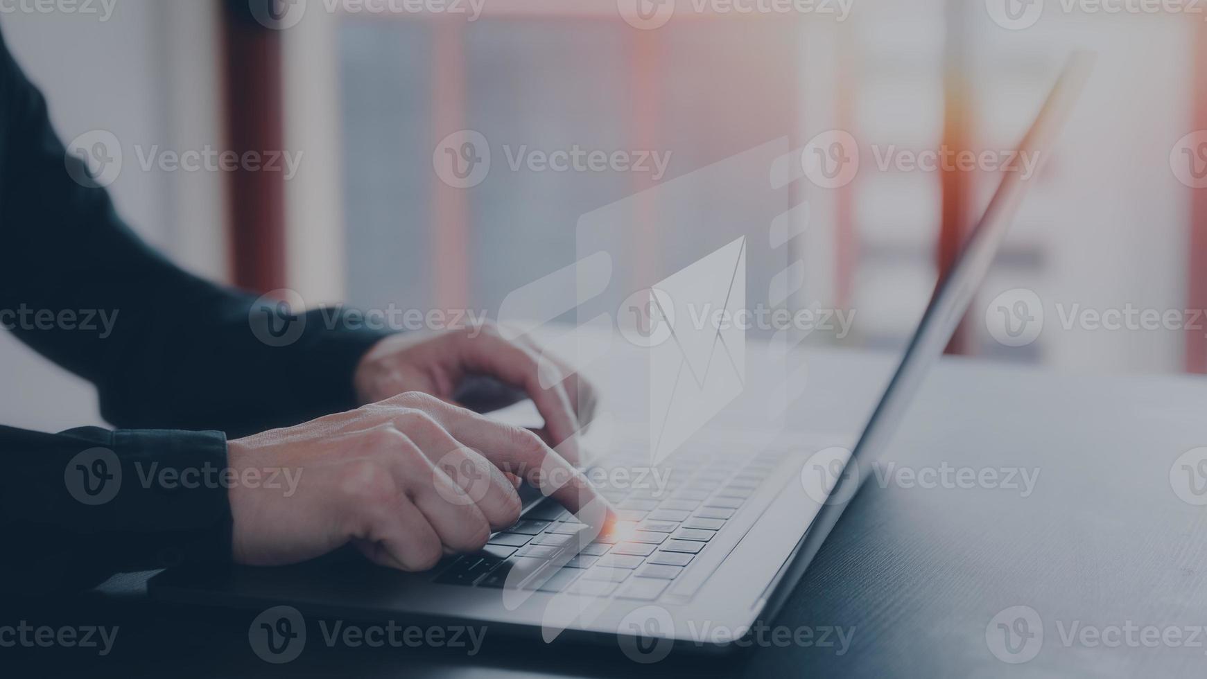 email concept, businessman working on computer laptop sending receiving email photo