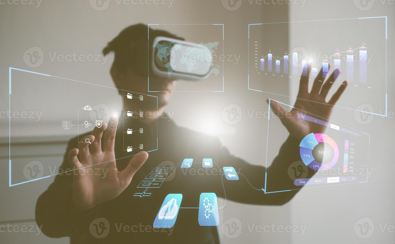 data analysis concept. man wearing VR glasses working with virtual data charts photo