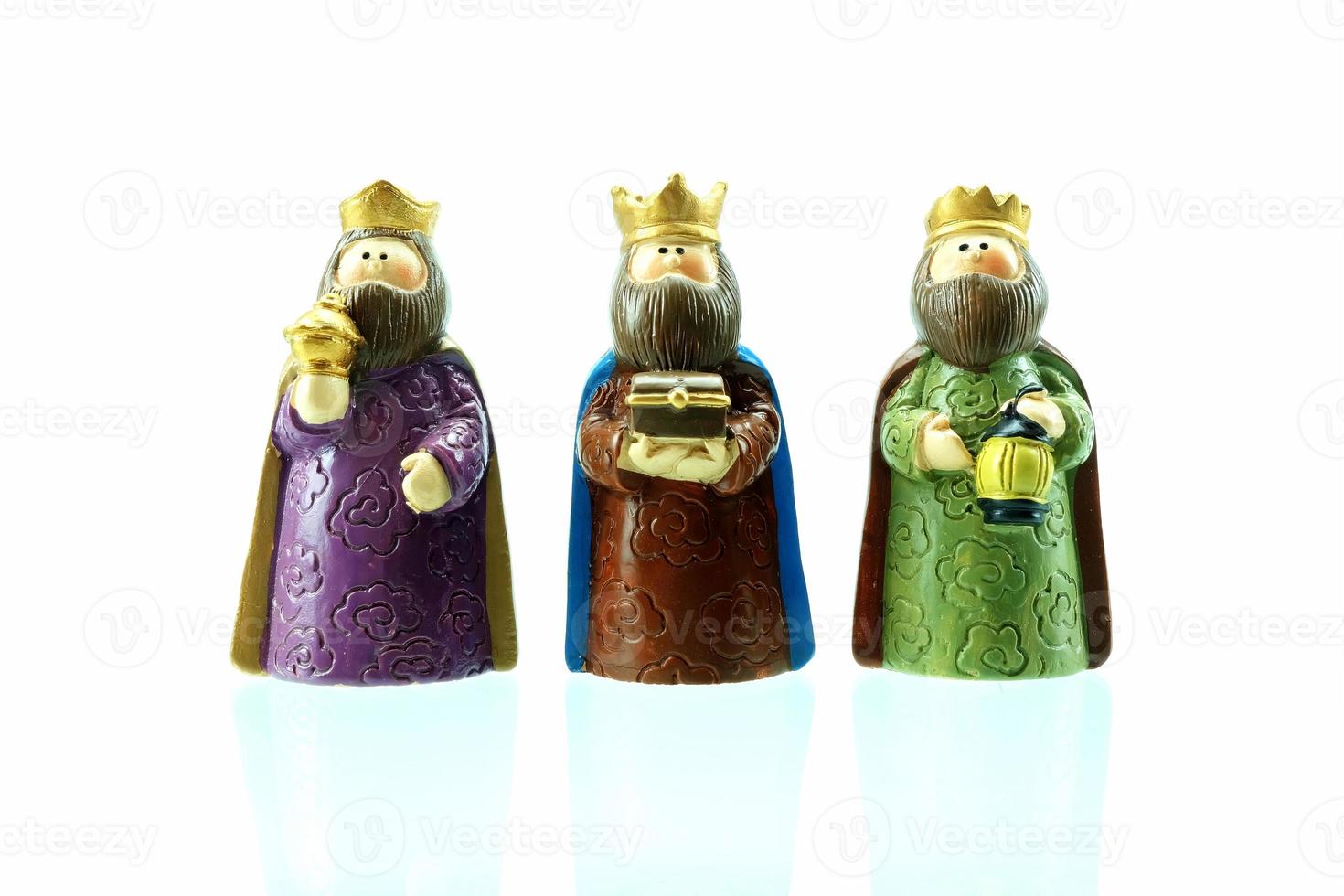 Close up Three Kings Isolated on White Background in Nativity Concept. photo