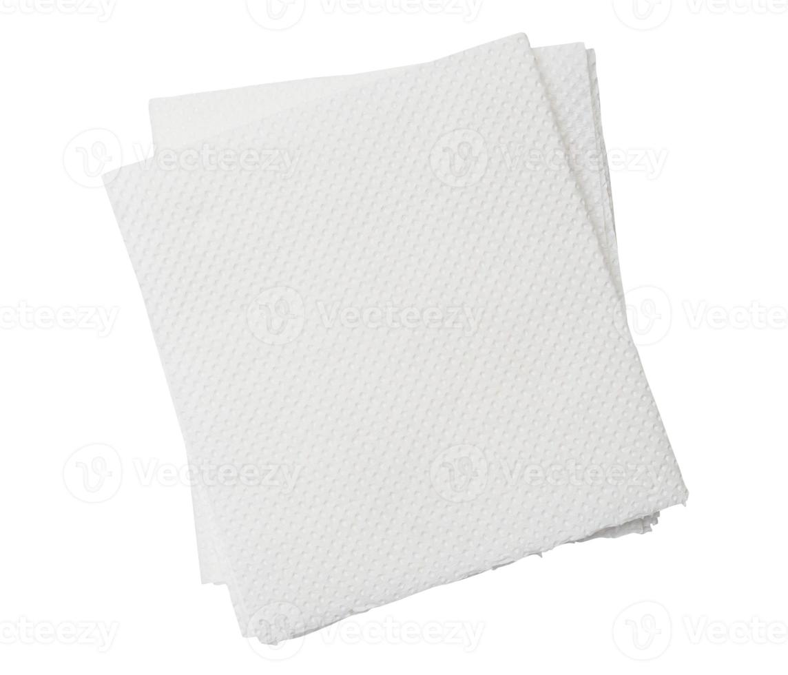 Two folded pieces of white tissue paper or napkin in stack tidily prepared for use in toilet or restroom isolated on white background with clipping path photo