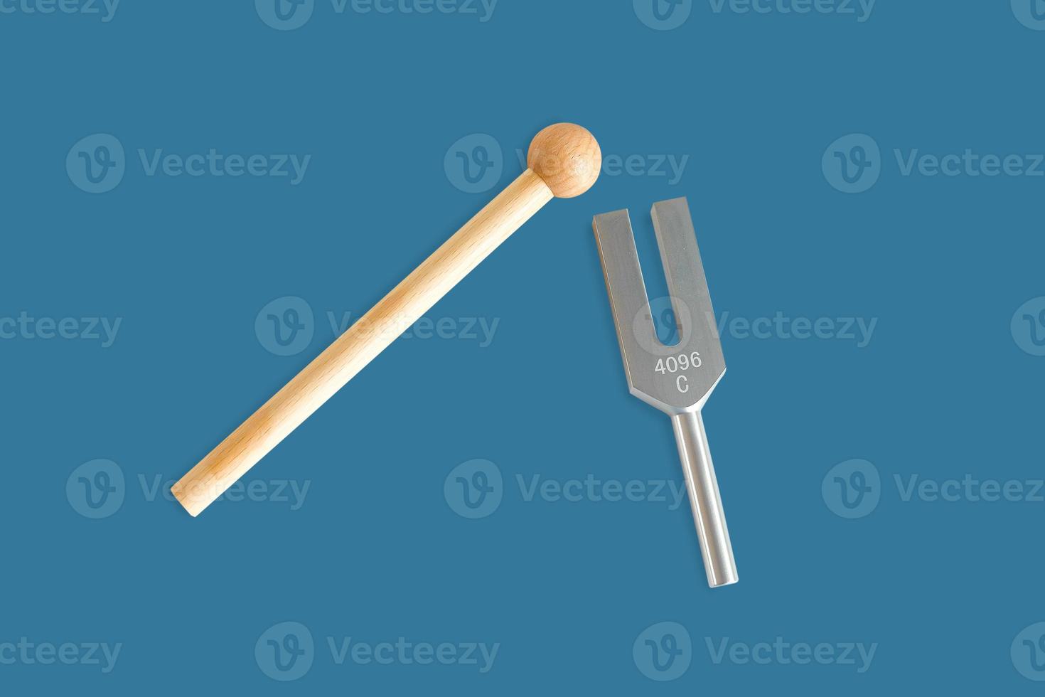 Tuning fork in sound therapy or  tunning musical instruments . photo