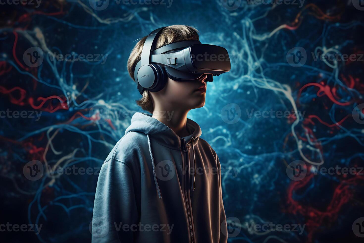 Portrait of a boy in a virtual reality helmet. The concept of virtual reality. photo