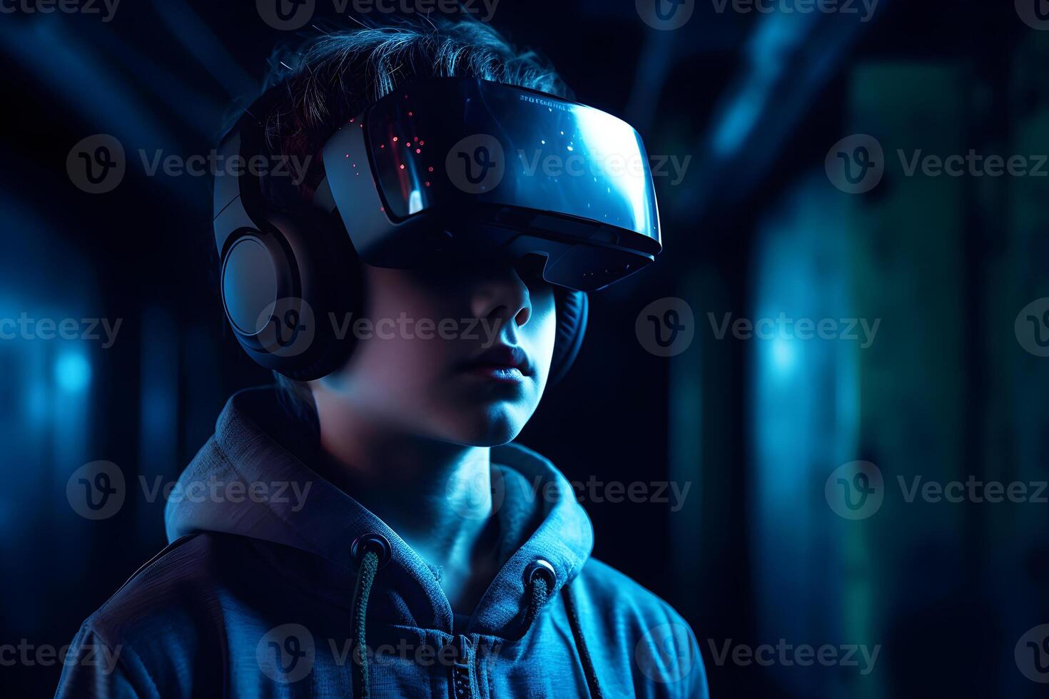 Portrait of a boy in a virtual reality helmet. The concept of virtual reality. photo