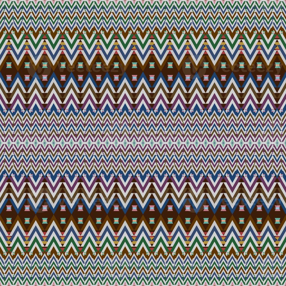 Ikat geometric folklore ornament. Tribal ethnic texture. Seamless striped pattern in Aztec style. Figure tribal embroidery. Indian, Scandinavian, Gyp sy, Mexican, folk pattern. Seamless pattern fab photo