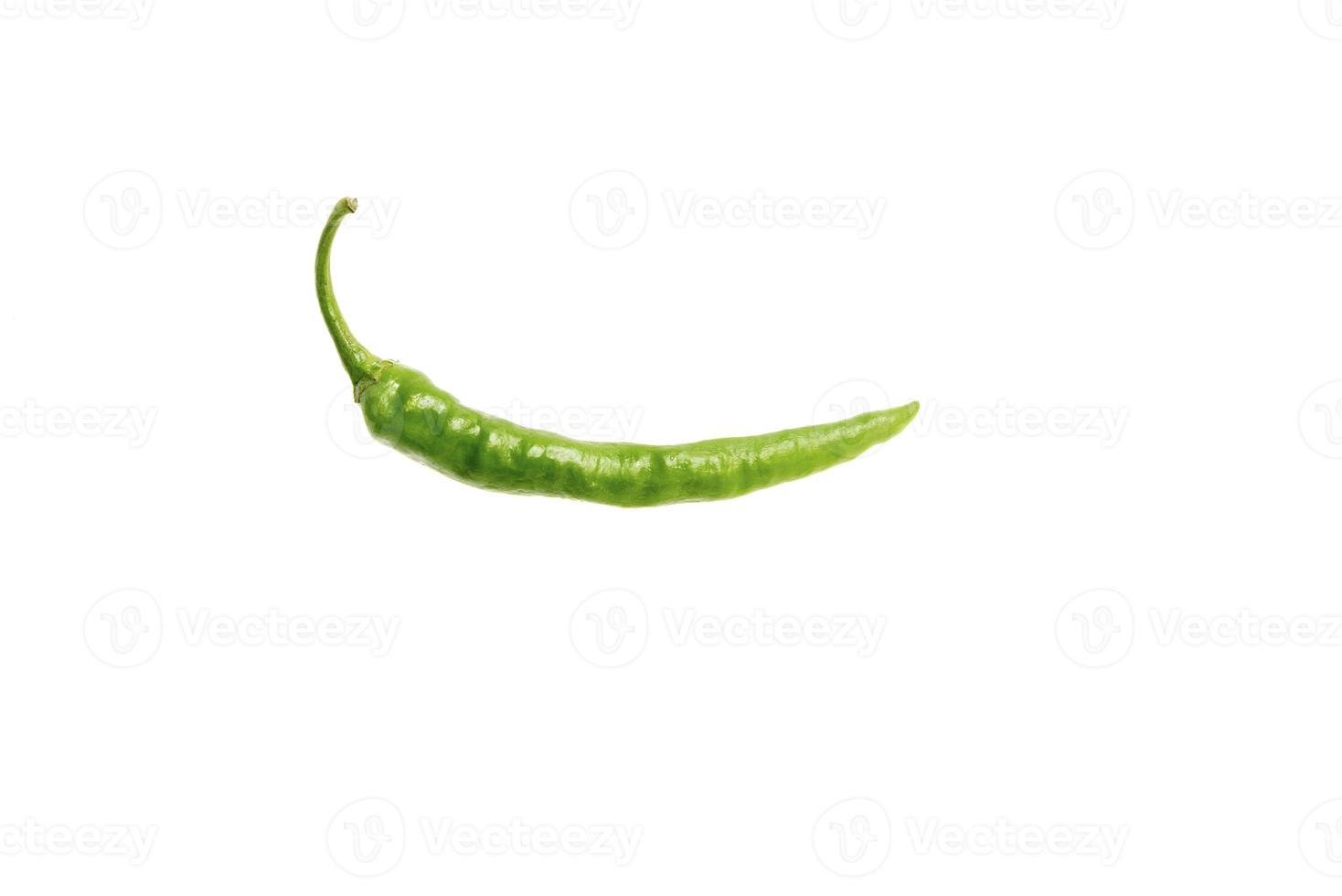 Green chili pepper isolated on white photo