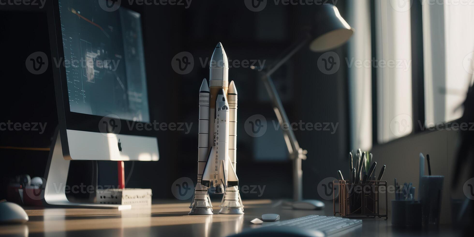 Business start up concept with rocket launching in workplace. photo