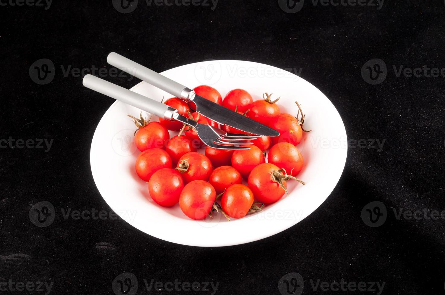 A plate of tomatoes photo