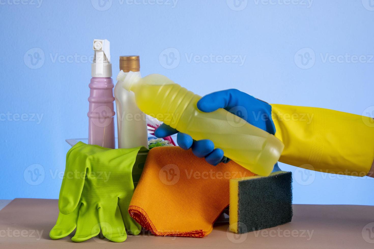 basket with cleaning products for home hygiene use photo