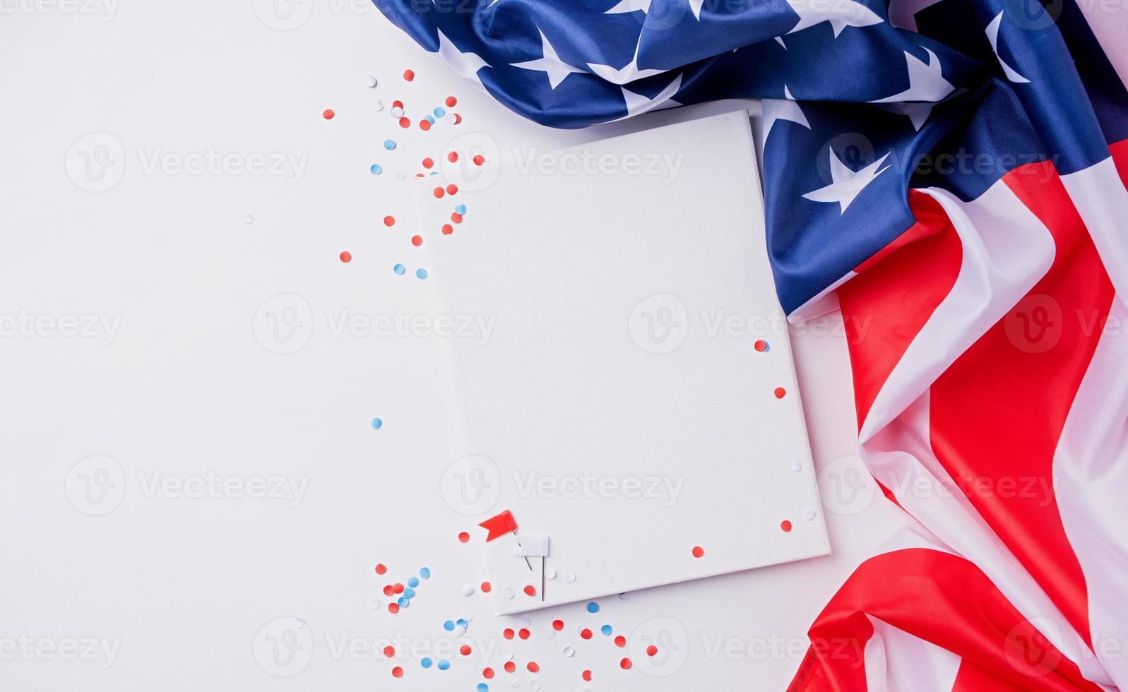 Blank white frame for mockup design on American national flag white background with decorations photo