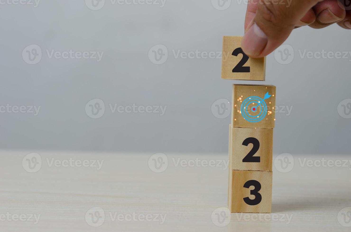 2023 numbers on set of wooden blocks start up concept. photo