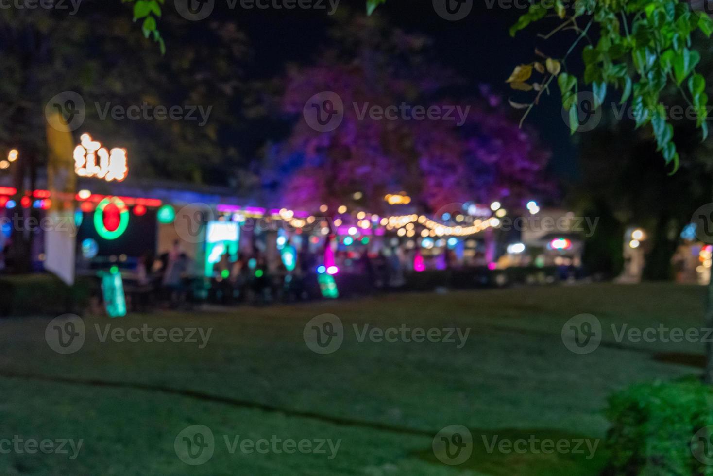 Blurred people eat at restaurants outside. For a background image photo