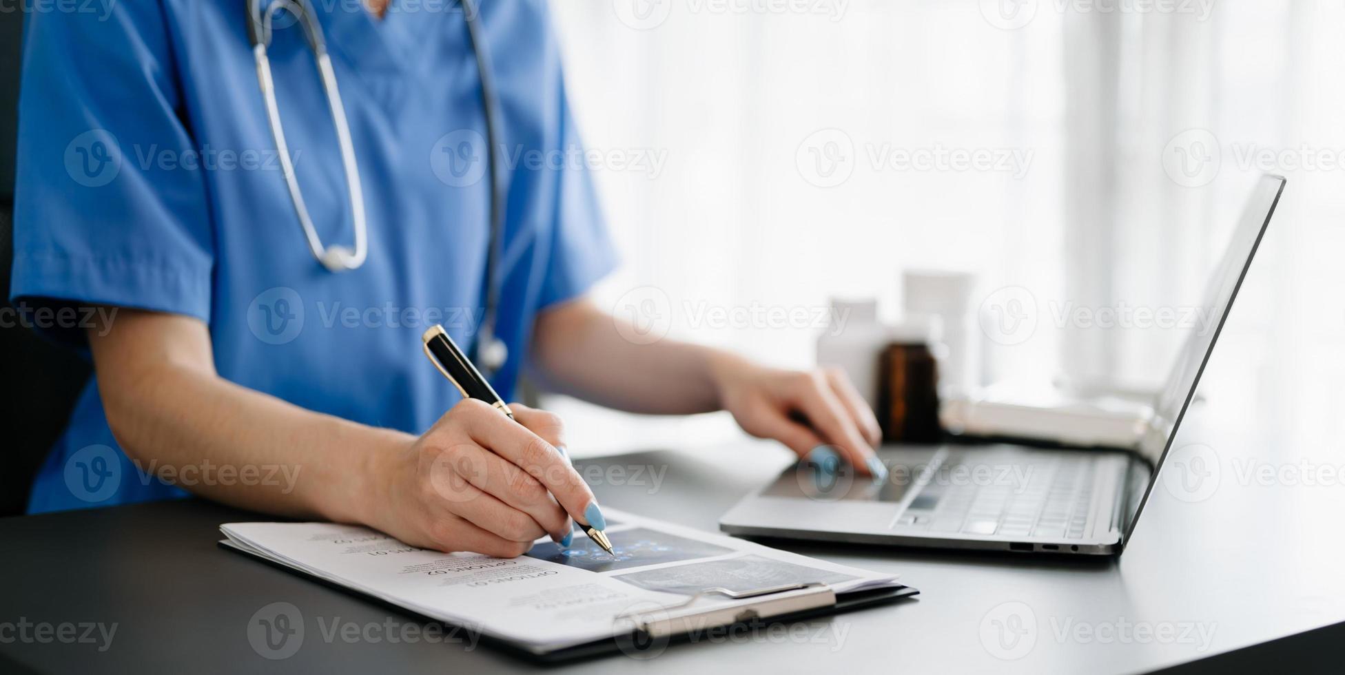 Medical technology concept. Doctor working with mobile phone and stethoscope in modern office photo