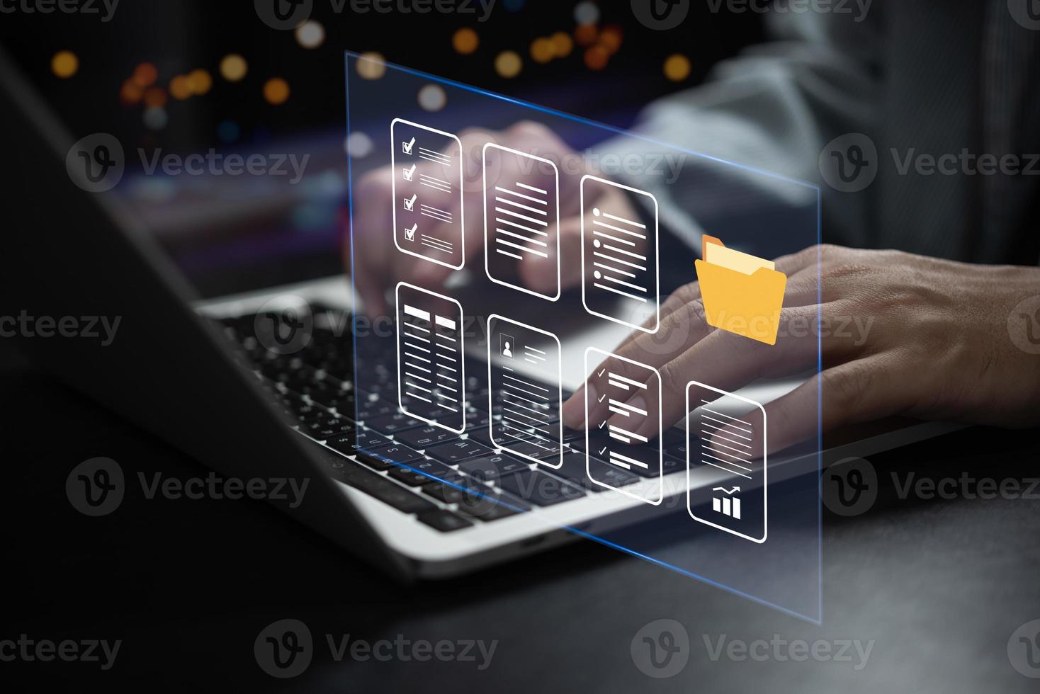 Businessman working online data and document system on laptop with virtual screen. Online database and document management system and keep in security folder concept. photo