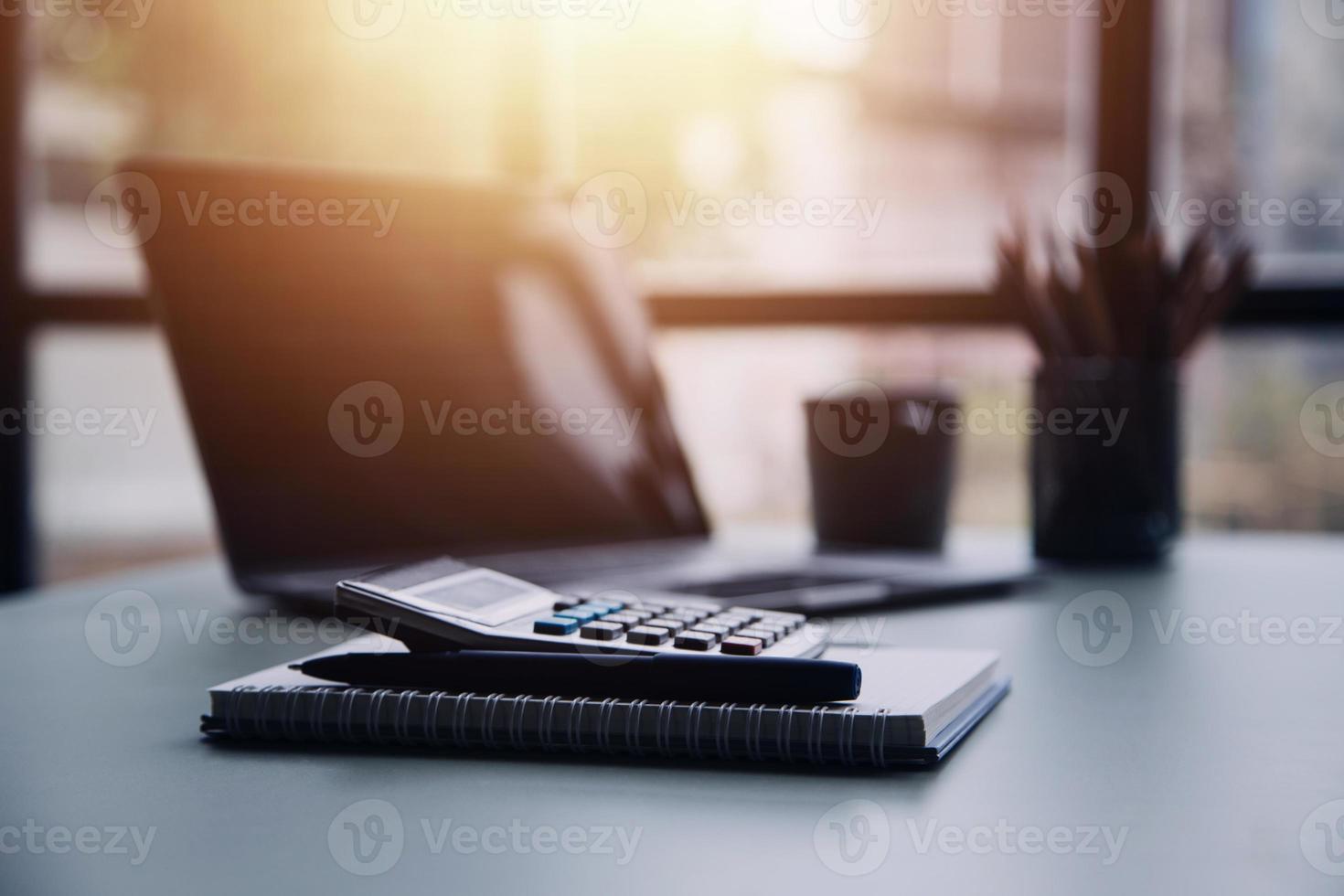 Group of confident business people point to graphs and charts to analyze market data, balance sheet, account, net profit to plan new sales strategies to increase production capacity. photo