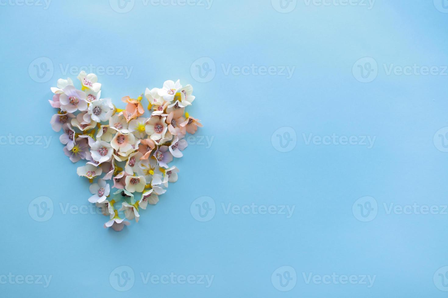 Layout top view heart of flowers photo
