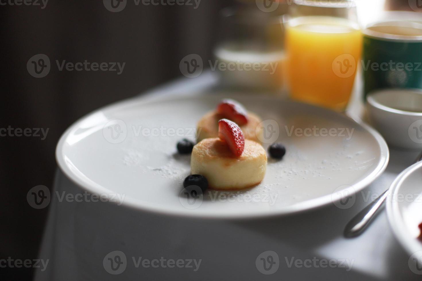 Breakfast of Cheesecakes with fresh berries photo