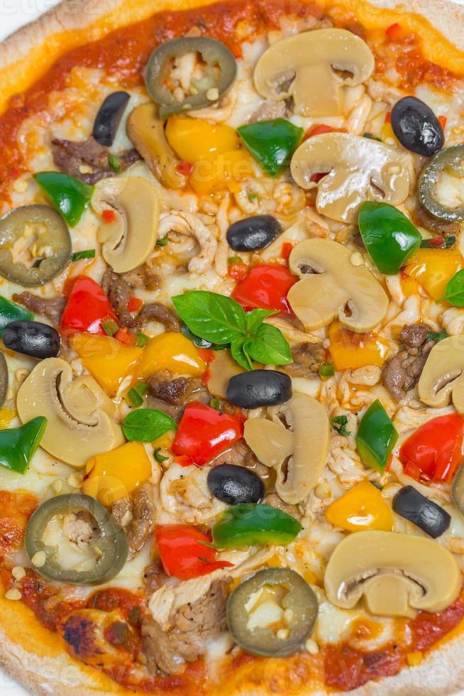 Closeup of Chicken mushroom jalapeno and red pepper pizza on white plate isolated on white background. Homemade Pizza. photo