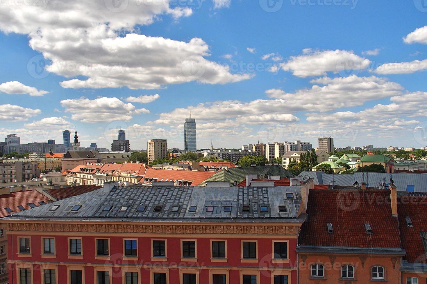 A view from above of the Warsaw old city and the surrounding buildings on a summer  day photo