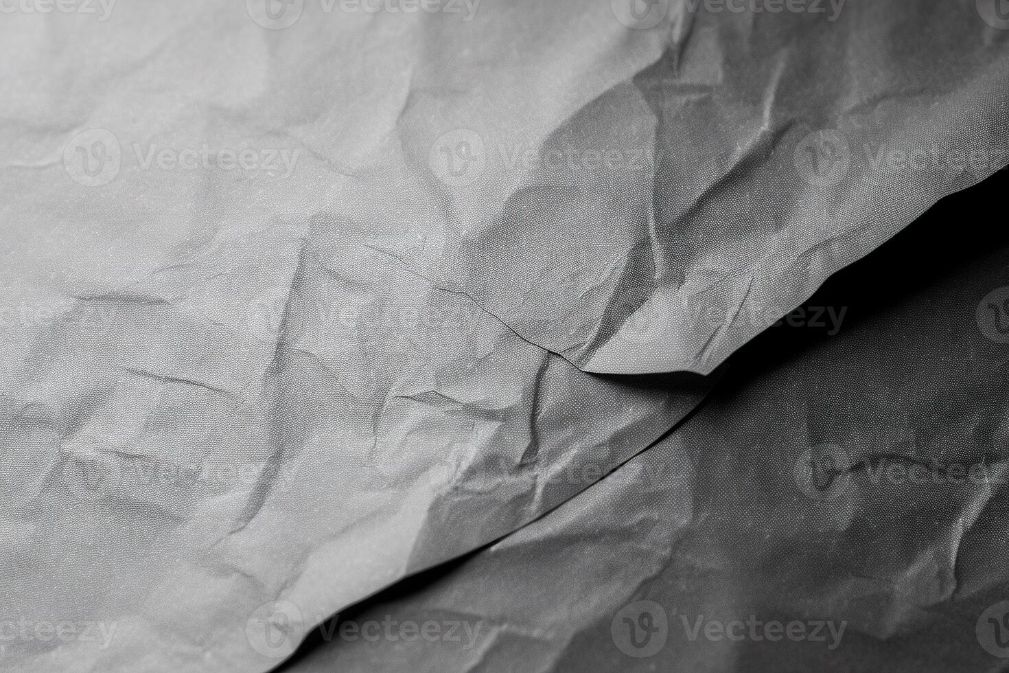 Design space grey crumpled paper textured background. photo