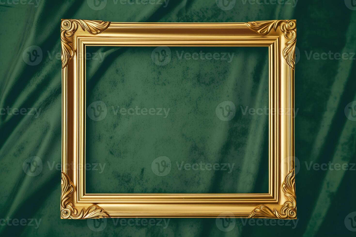 Golden frame on green background. photo