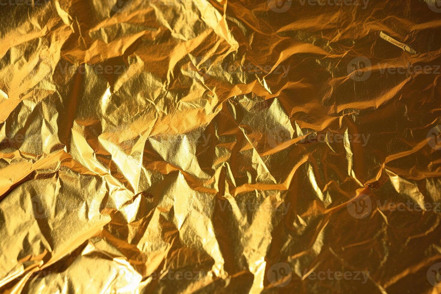 Design space gold crumpled foil paper textured background. photo