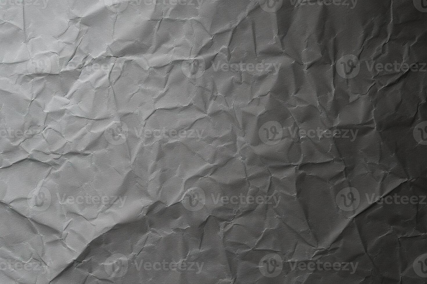 Design space grey crumpled paper textured background. photo