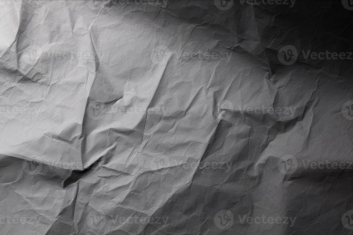 Design space grey crumpled paper textured background. photo