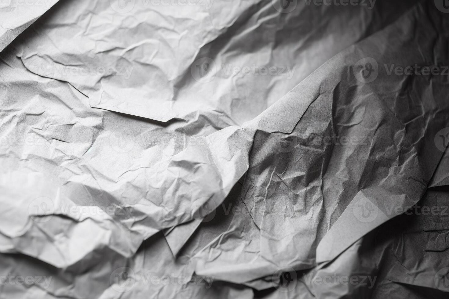 Design space grey crumpled paper textured background. photo