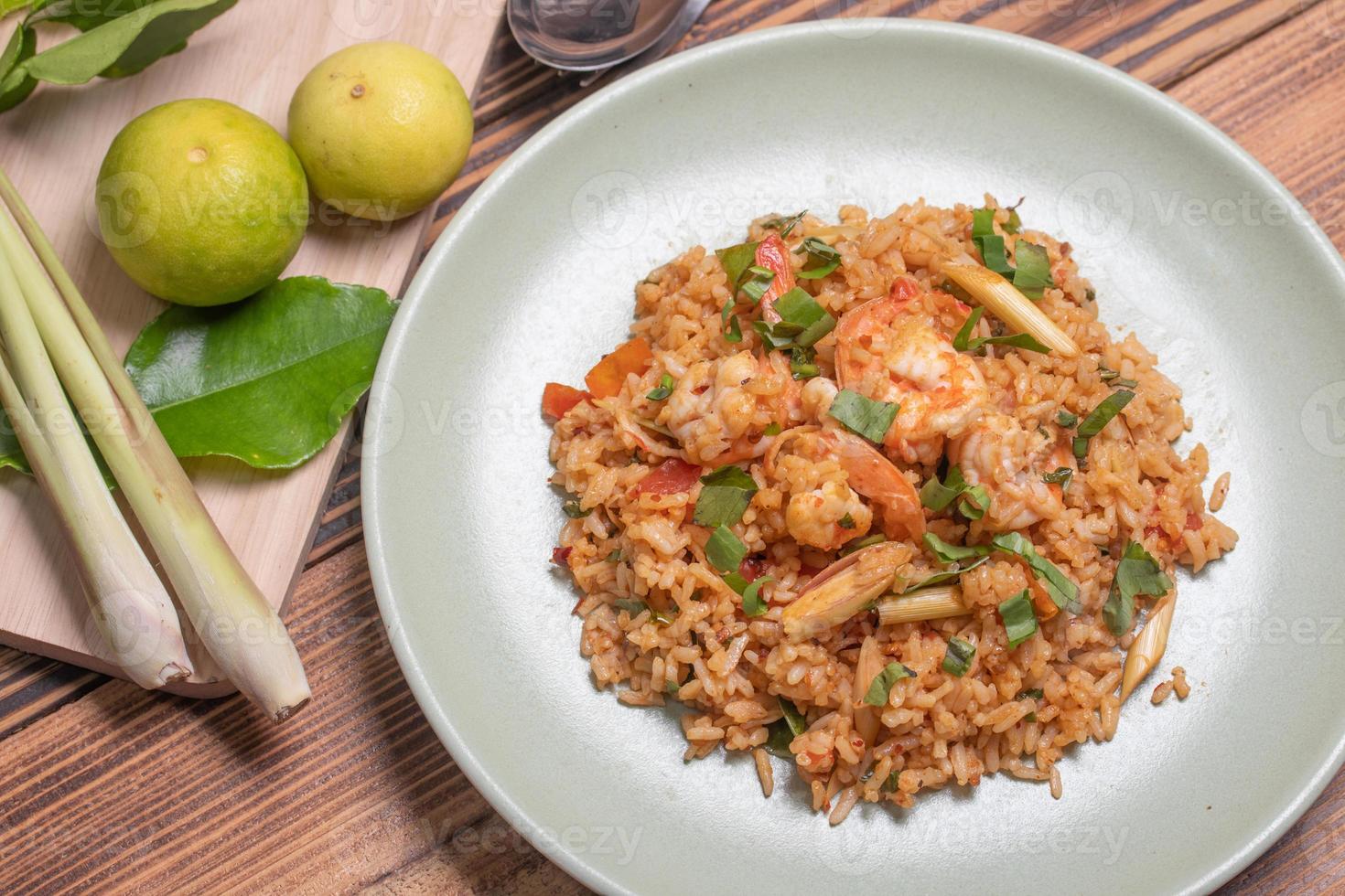 Fried rice with tom yum goong in a plate photo