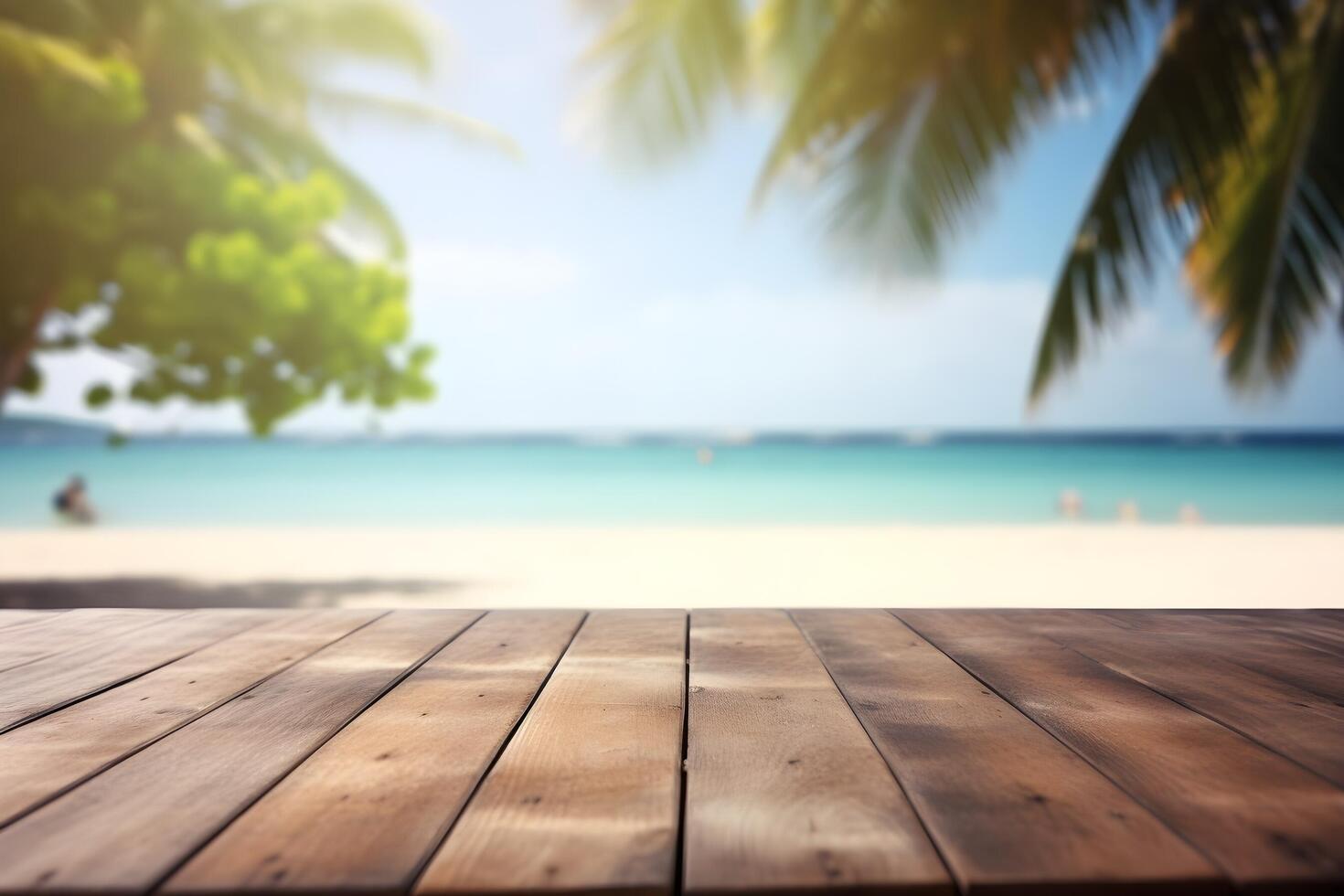 Table in front of blurred tropical beach of summer time background. photo